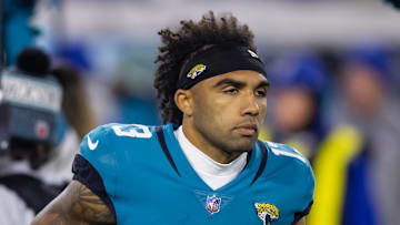 Jan 14, 2023; Jacksonville, Florida, USA; Jacksonville Jaguars wide receiver Christian Kirk (13) against the Los Angeles Chargers during a wild card playoff game at TIAA Bank Field. 