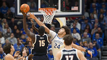 Dec 5, 2025; Nashville, TN, USA; Gonzaga Bulldogs forward Graham Ike (15) shoots over  Kentucky Wildcats center Malachi Moreno (24) during the first half at Bridgestone Arena. 