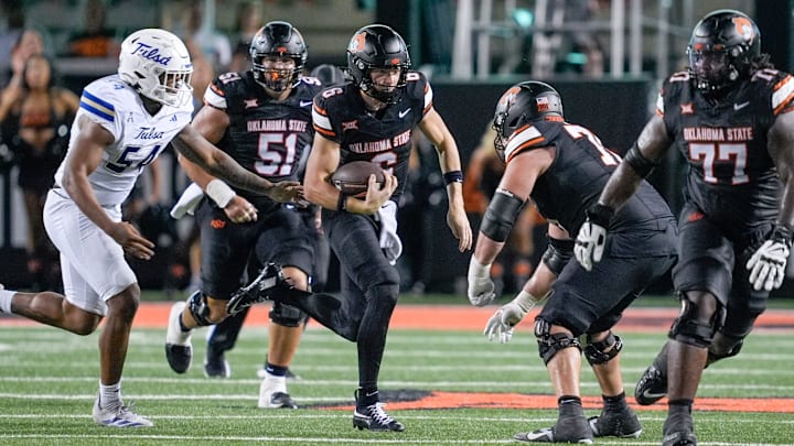 Oklahoma State quarterback Zane Flores (6) runs the ball in the third quarter during an NCAA football game between Oklahoma State (OSU) and Tulsa at Boone Pickens Stadium in Stillwater, Okla., on Friday, Sept. 19, 2025.
