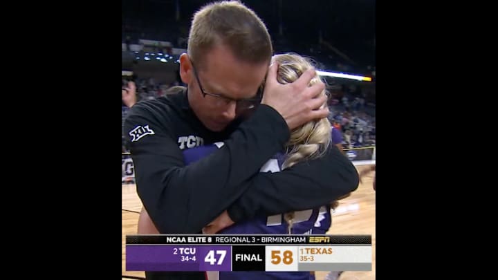 TCU coach Mark Campbell and Hailey Van Lith embrace after losing to the Texas Longhorns on March 31, 2025.