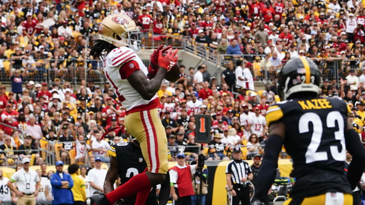 Sep 10, 2023; Pittsburgh, Pennsylvania, USA; San Francisco 49ers wide receiver Brandon Aiyuk (11) catches a pass for a touchdown against the Pittsburgh Steelers during the first half at Acrisure Stadium. Mandatory Credit: Gregory Fisher-USA TODAY Sports