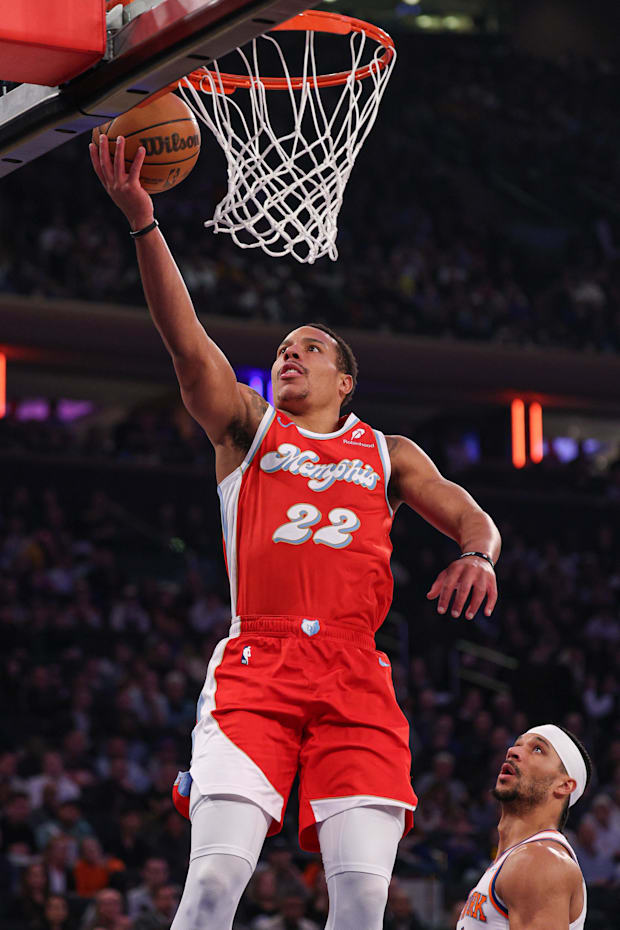 Memphis Grizzlies guard Desmond Bane goes to the basket in front of New York Knicks guard Josh Hart