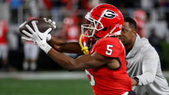 Georgia wide receiver Rara Thomas (5) makes a catch during warm ups before the start of a NCAA