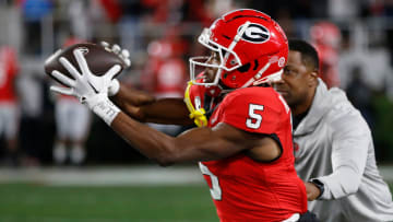 Georgia wide receiver Rara Thomas (5) makes a catch during warm ups before the start of a NCAA college football game against Ole Miss in Athens, Ga., on Saturday, Nov. 11, 2023.