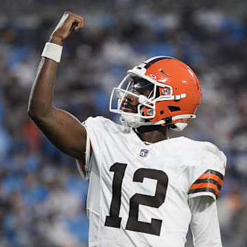 Aug 8, 2025; Charlotte, North Carolina, USA;  Cleveland Browns quarterback Shedeur Sanders (12) celebrates his touchdown pass against the Carolina Panthers during the second quarter at Bank of America Stadium. Mandatory Credit: Jim Dedmon-Imagn Images