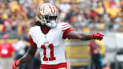 Sep 10, 2023; Pittsburgh, Pennsylvania, USA;  San Francisco 49ers wide receiver Brandon Aiyuk (11) gestures at the line of scrimmage against the Pittsburgh Steelers during the first quarter at Acrisure Stadium. Mandatory Credit: Charles LeClaire-USA TODAY Sports