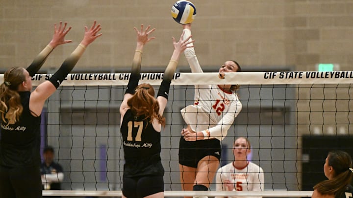 Cathedral Catholic senior outside hitter Mae Kordas sends down one of her 18 kills in the Dons' three-game sweep over Mity in the CIF State Open Division Championship Nov. 23 at Santiago Canyon College