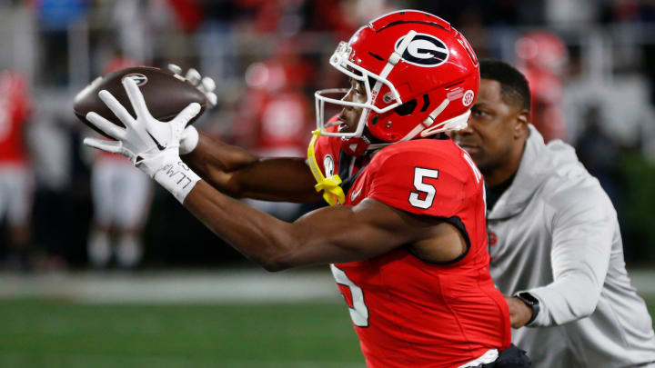 Georgia wide receiver Rara Thomas (5) makes a catch during warm ups before the start of a NCAA college football game against Ole Miss in Athens, Ga., on Saturday, Nov. 11, 2023.