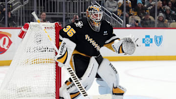 Jan 14, 2025; Pittsburgh, Pennsylvania, USA;  Pittsburgh Penguins goaltender Tristan Jarry (35) guards the net against the Seattle Kraken during the second period at PPG Paints Arena. Mandatory Credit: Charles LeClaire-Imagn Images