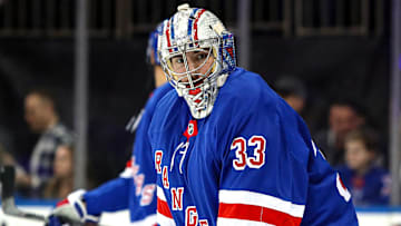 Dec 8, 2024; New York, New York, USA; New York Rangers goalie Dylan Garand (33) warms up before his NHL debut against the Seattle Kraken at Madison Square Garden. Mandatory Credit: Danny Wild-Imagn Images