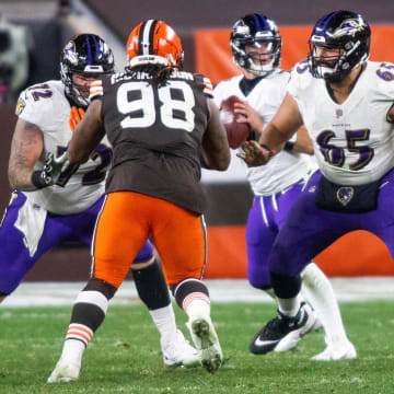 Baltimore Ravens offensive guard Ben Powers (72) and center Patrick Mekari (65) block Cleveland Browns defensive tackle Sheldon Richardson (98) during the fourth quarter at FirstEnergy stadium. 