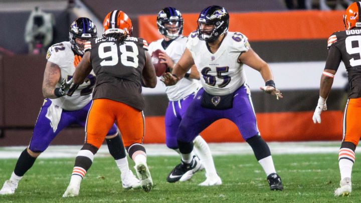 Baltimore Ravens offensive guard Ben Powers (72) and center Patrick Mekari (65) block Cleveland Browns defensive tackle Sheldon Richardson (98) during the fourth quarter at FirstEnergy stadium. 