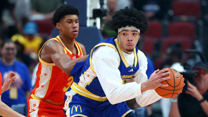 Mar 31, 2026; Glendale, AZ, USA; Tyran Stokes (4) controls the ball against Bruce Branch III (3) during the McDonalds All American Boys Game at Desert Diamond Arena. Mandatory Credit: Mark J. Rebilas-Imagn Images