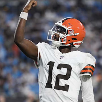Aug 8, 2025; Charlotte, North Carolina, USA;  Cleveland Browns quarterback Shedeur Sanders (12) celebrates his touchdown pass against the Carolina Panthers during the second quarter at Bank of America Stadium. Mandatory Credit: Jim Dedmon-Imagn Images