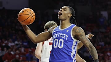 Feb 26, 2025; Norman, Oklahoma, USA; Kentucky Wildcats guard Otega Oweh (00) reacts after a play against the Oklahoma Sooners during the first half at Lloyd Noble Center. Mandatory Credit: Alonzo Adams-Imagn Images