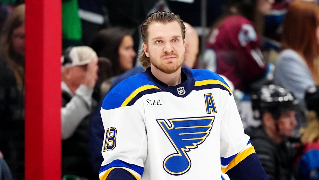 Mar 29, 2025; Denver, Colorado, USA; St. Louis Blues center Robert Thomas (18) before the game against the Colorado Avalanche at Ball Arena. Mandatory Credit: Ron Chenoy-Imagn Images