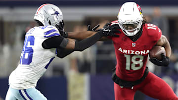 Nov 3, 2025; Arlington, Texas, USA; Arizona Cardinals wide receiver Marvin Harrison Jr. (18) runs against Dallas Cowboys cornerback DaRon Bland (26) in the second half at AT&T Stadium.