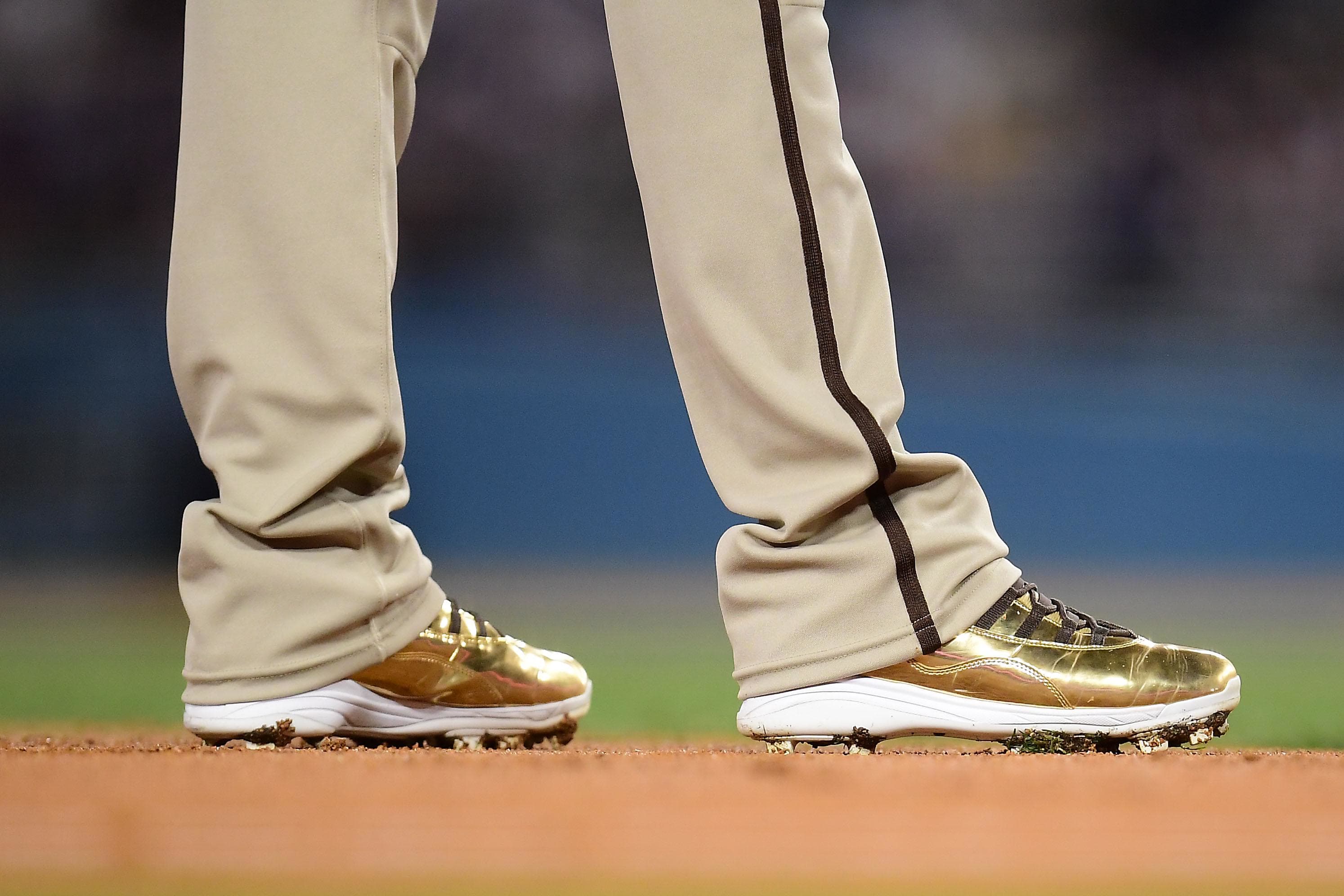 San Diego Padres third baseman Manny Machados' gold Air Jordan cleats.