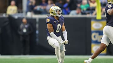 Oct 19, 2024; Atlanta, Georgia, USA; Notre Dame Fighting Irish safety Xavier Watts (0) celebrates after an interception against the Georgia Tech Yellow Jackets in the fourth quarter at Mercedes-Benz Stadium. Mandatory Credit: Brett Davis-Imagn Images
