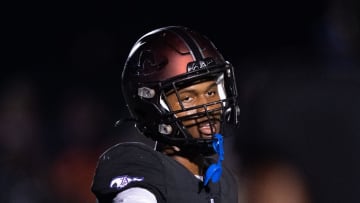 Lipscomb's Deuce Knight (2) directs his teammates against IMG at Lipscomb's Reese Smith Football Field in Nashville, Tenn., Friday night, Aug. 18, 2023. IMG went on to win the game 35-10.