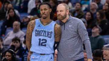 Dec 26, 2023; New Orleans, Louisiana, USA; Memphis Grizzlies head coach Taylor Jenkins talks with guard Ja Morant (12) in the second half against the New Orleans Pelicans at the Smoothie King Center. Mandatory Credit: Stephen Lew-USA TODAY Sports