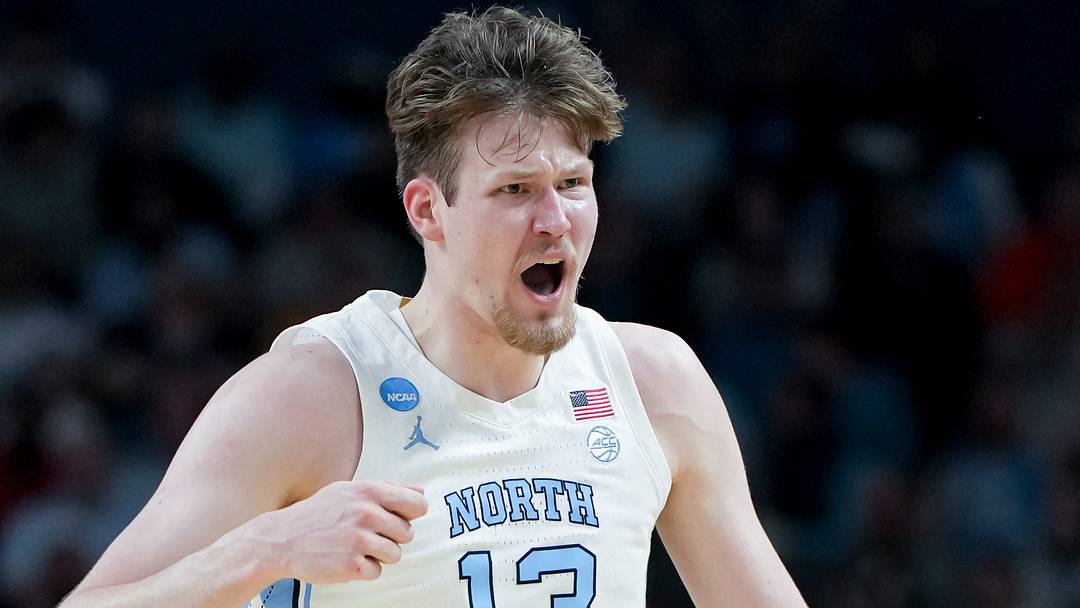 Mar 19, 2026; Greenville, SC, USA; North Carolina Tar Heels center Henri Veesaar (13) celebrates after a play against the VCU Rams in the first half of a first round game of the men's 2026 NCAA Tournament at Bon Secours Wellness Arena. Mandatory Credit: Bob Donnan-Imagn Images