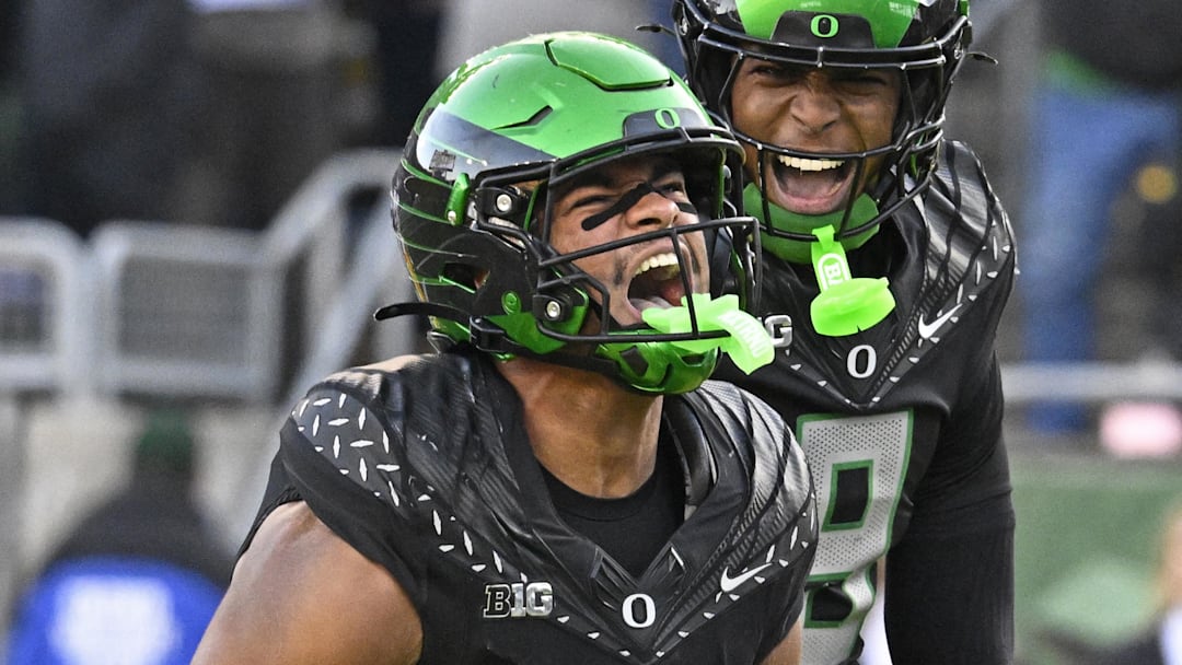 Nov 22, 2025; Eugene, Oregon, USA;  Oregon Ducks tight end Kenyon Sadiq (18) celebrates against the Southern California Trojans during the second half at Autzen Stadium. Mandatory Credit: Troy Wayrynen-Imagn Images