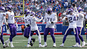 Sep 8, 2024; East Rutherford, New Jersey, USA; Minnesota Vikings cornerback Byron Murphy Jr. (7) celebrates with teammates after defensive stop during the second half against the New York Giants at MetLife Stadium.