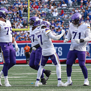 Sep 8, 2024; East Rutherford, New Jersey, USA; Minnesota Vikings cornerback Byron Murphy Jr. (7) celebrates with teammates after defensive stop during the second half against the New York Giants at MetLife Stadium. Mandatory Credit: Vincent Carchietta-Imagn Images