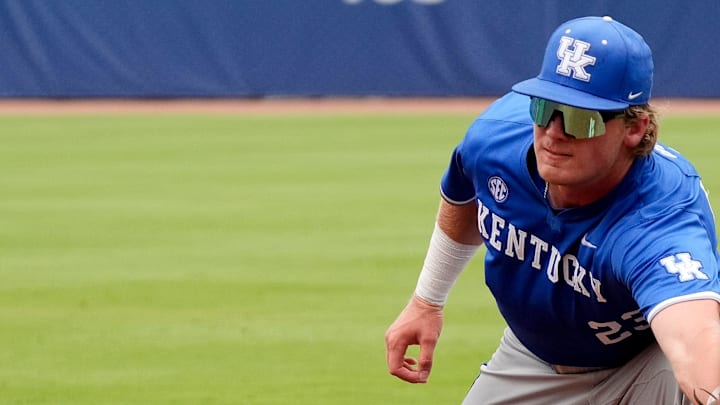 May 20, 2025; Hoover, AL, USA; Kentucky first baseman Hudson Brown (23) snags a hard-hit ball not he first baseline during the game with Oklahoma in the first round of the SEC Baseball Tournament at the Hoover Met.