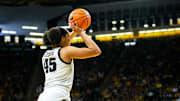 Iowa forward Hannah Stuelke (45) shoots the ball during a NCAA Big Ten Conference women's basketball game against Indiana, Sunday, Feb. 26, 2023, at Carver-Hawkeye Arena in Iowa City, Iowa.