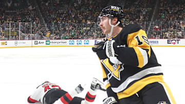 Mar 15, 2025; Pittsburgh, Pennsylvania, USA;  Pittsburgh Penguins center Connor Dewar (19) reacts fter scoring his second goal of the game against the New Jersey Devils during the third period at PPG Paints Arena. Mandatory Credit: Charles LeClaire-Imagn Images