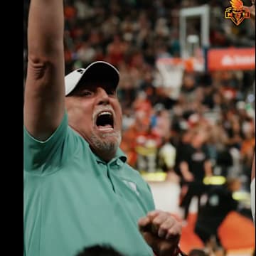 Dan Ionescu, above, was clearly fired up for his superstar daughter.