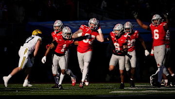 Ohio State Buckeyes defensive end Jack Sawyer (33) reacts to intercepting a pass during the second half of the NCAA football game against the Michigan Wolverines at Ohio Stadium in Columbus on Saturday, Nov. 30, 2024. Michigan won 13-10.