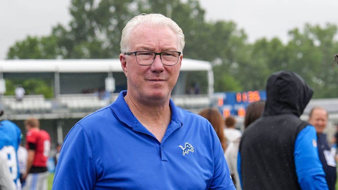 President and CEO Rod Wood walks the sidelines during the Detroit Lions training camp 