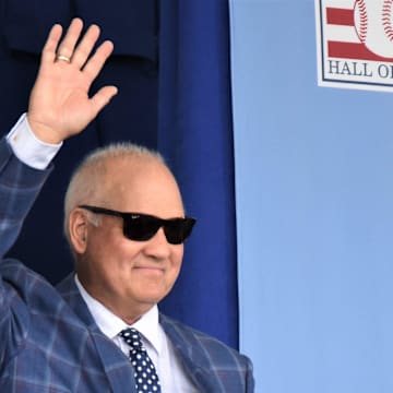 Ryne Sandberg acknowledges the crowd at Baseball Hall of Fame induction day in 2024.