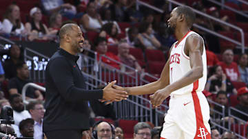 Oct 8, 2025; Houston, Texas, USA; Houston Rockets Head Coach Ime Udoka and forward Kevin Durant (7) react during the third quarter against the Utah Jazz at Toyota Center. Mandatory Credit: Troy Taormina-Imagn Images