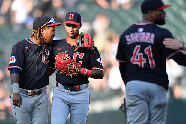 Jose Ramirez (11) and shortstop Brayan Rocchio (4) celebrate