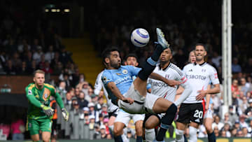 Ilkay Gundogan's overhead kick past Fulham's defense helped seal Champions League play for Manchester City.
