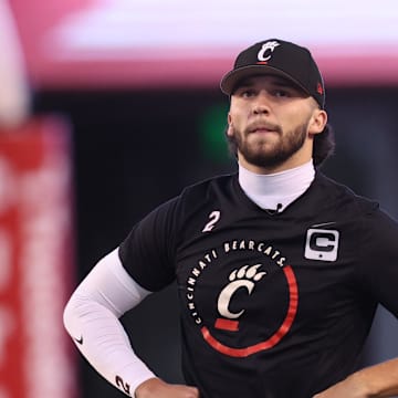 Nov 1, 2025; Salt Lake City, Utah, USA; Cincinnati Bearcats quarterback Brendan Sorsby (2) warms up before the game against the Utah Utes at Rice-Eccles Stadium. Mandatory Credit: Rob Gray-Imagn Images
