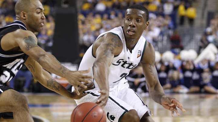 Apr 3, 2010; Indianapolis, IN, USA; Michigan State Spartans forward Raymar Morgan (2) passes the ball away from Butler Bulldogs forward Willie Veasley (21) during the second half of the semifinals of the Final Four of the 2010 NCAA mens basketball tournament at Lucas Oil Stadium. Butler won 52-50. Mandatory Credit: Bob Donnan-Imagn Images