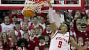 Wisconsin guard John Tonje (9) throws down a dunk during the first half of their game against Michigan Tuesday, December 3, 2024 at the Kohl Center in Madison, Wisconsin.