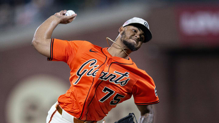 May 16, 2025; San Francisco, California, USA; San Francisco Giants pitcher Camilo Doval (75) delivers a pitch against the Athletics during the ninth inning at Oracle Park. 