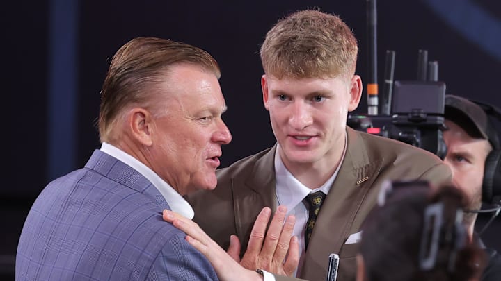 Jun 25, 2025; Brooklyn, NY, USA; Kasparas Jakucionis reacts with Illinois Fighting Illini head coach Brad Underwood after being selected as the 20th pick by the Miami Heat in the first round of the 2025 NBA Draft at Barclays Center. Mandatory Credit: Brad Penner-Imagn Images