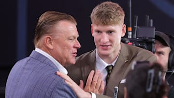 Jun 25, 2025; Brooklyn, NY, USA;  Kasparas Jakucionis reacts with Illinois Fighting Illini head coach Brad Underwood after being selected as the 20th pick by the Miami Heat in the first round of the 2025 NBA Draft at Barclays Center. Mandatory Credit: Brad Penner-Imagn Images