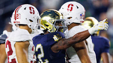 Notre Dame running back Devyn Ford (22) celebrates getting a first down during a NCAA college football game between Notre Dame and Stanford at Notre Dame Stadium on Saturday, Oct. 12, 2024, in South Bend.