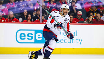 Jan 28, 2025; Calgary, Alberta, CAN; Washington Capitals left wing Alex Ovechkin (8) skates against the Calgary Flames during the first period at Scotiabank Saddledome. Mandatory Credit: Sergei Belski-Imagn Images
