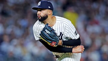 Sep 30, 2025; Bronx, New York, USA; New York Yankees pitcher Devin Williams (38) throws a pitch during the eighth inning against the Boston Red Sox during game one of the Wildcard round for the 2025 MLB playoffs at Yankee Stadium.