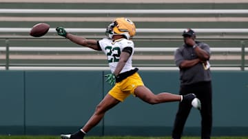 Green Bay Packers wide receiver Matthew Golden (22) misses the ball during the team's first day of minicamp on June 10, 2025, at Ray Nitschke Field in Ashwaubenon, Wis.