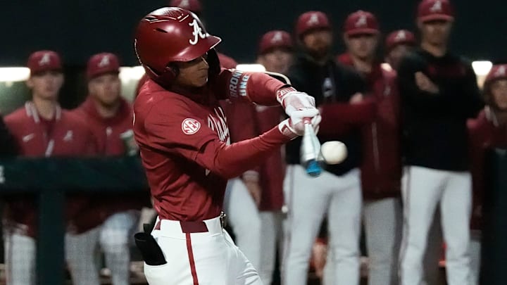 Mar 20, 2025; Tuscaloosa AL, USA; Alabama shortstop Justin Lebron (1) connects for a three-run double during the game with Tennessee at Sewell-Thomas Stadium.